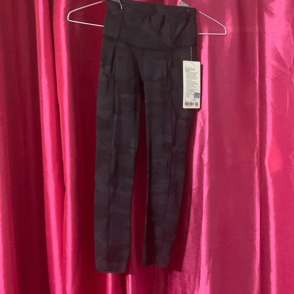 Lululemon Capri leggings. Black and grey camo pattern.